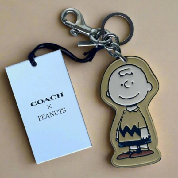 Coach x Peanuts Charlie Brown Leather Bag Charm Keychain CBG59 2025 Anniversary - Picture 1 of 8